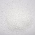 Citric acid white background.Citric acid crystal top view. Royalty Free Stock Photo