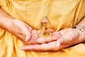 Citrine crystal holding by a woman