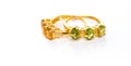 Citrine and Peridot with Diamond Jewel or gems ring on white background with reflection. Collection of natural gemstones