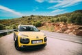 Citroen C4 Cactus Car Parked On Background Of Spanish Mountain Nature Landscape. The Citroen C4 Cactus Is A Mini