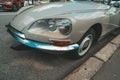 Citroen DS car parked on street, front side view of classic french auto