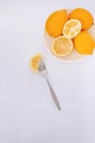 Citrus background, lemon in a bowl. Top view with lemon theme on white. Royalty Free Stock Photo