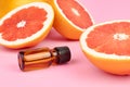 Citrus essential oil with fresh grapefruit slices. Aromatherapy.