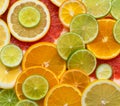 Citrus fruit background. Sliced citrus fruit close up. Orange, lime, lemon and grapefruit textures. Top view, flat lay Royalty Free Stock Photo