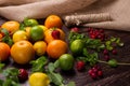 Citrus fruit, fresh mint and berries. Royalty Free Stock Photo