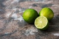 Citrus fruit lime on a rustic dark background. Selective focus Royalty Free Stock Photo
