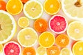 Citrus fruit pattern of lemon, orange, grapefruit, sweetie and pomelo. Fruit background. Flat lay, top view. Royalty Free Stock Photo