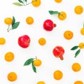 Citrus fruit and red garnet isolated on white background. Flat lay. Top view