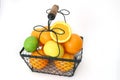 Citrus Fruit In A Wire Basket Royalty Free Stock Photo