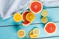 Citrus fruits against a blue wooden table Royalty Free Stock Photo