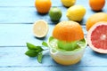 Citrus fruits with juicer Royalty Free Stock Photo