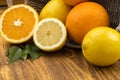 citrus fruits on a old wooden table Royalty Free Stock Photo