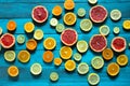 Citrus fruits orange, lemon, grapefruit, mandarin, lime on blue background Royalty Free Stock Photo