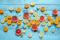 Citrus fruits orange, lemon, grapefruit, mandarin, lime on blue background Royalty Free Stock Photo