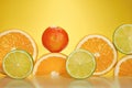 Citrus fruits. Orange Lime slices and Tangerine or mandarin in a row Royalty Free Stock Photo