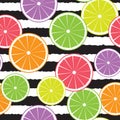 Citrus fruits seamless pattern on black striped background Royalty Free Stock Photo