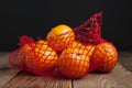 Citrus Fruits Tangerine in Oranges in plastic net bag package. no plastic concept. Packaging that does not recycle. Plastic. Rusti Royalty Free Stock Photo