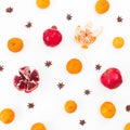 Citrus, garnet and anise on white background. New year holiday concept. Flat lay. Top view