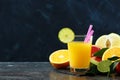 Citrus juice fruit or smoothies on dark background Royalty Free Stock Photo