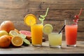 Citrus juice three glasses with orange fruit lemon and grapefruit