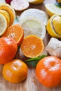 Citrus - Lemon, lime, mandarine and ginger fresh slices for a delicious drink Royalty Free Stock Photo