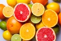 Citrus, orange, lime, lemon and grapefruit on a table