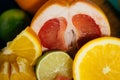 Citrus, oranges, lemons, limes, grapefruit, pomelo on vintage bo Royalty Free Stock Photo