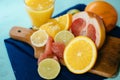 Citrus, oranges, lemons, limes, grapefruit, pomelo on vintage bo Royalty Free Stock Photo