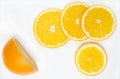 Citrus round slices on a white background