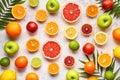 Citrus sliced harvest fruits background flat lay, helthy vegetarian organic food