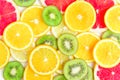Citrus slices - kiwi, oranges and grapefruits on white background. Fruits backdrop Royalty Free Stock Photo