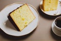 Citrus slices Lemon cake on plate on table for breakfast Royalty Free Stock Photo