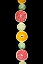 citrus slices, ,orange, lemon, lime and grapefruit black background. Top view