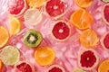 Citrus Slices on Pink Plastic Wrap Royalty Free Stock Photo