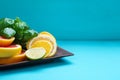 Citrus slices on the plate. Sliced grapefruit, lemon, lime and o