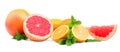 Citruses and mint leaves on a white background. Different exotic fruits: grapefruit, orange, and lemon. Vitamin C.