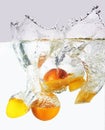 Citruses into water Royalty Free Stock Photo