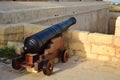 CITTADELLA, GOZO, MALTA - Oct 11, 2014: Cannon displayed on top of the defensive walls and bastions of the Cittadella foritified