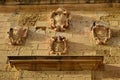 CITTADELLA, GOZO, MALTA - Oct 11, 2014: Pigeon resting on the facade of an old building in the Cittadella, Gozo