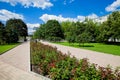 City alley with flower beds and lawns, accomplishment of territory Royalty Free Stock Photo