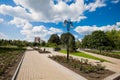 City alley with flower beds and lawns, accomplishment of territory Royalty Free Stock Photo