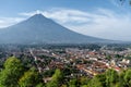 The city of Antigua in Guatemala at the foot of the Agua volcano. Royalty Free Stock Photo