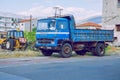 City Athens, Greek Republic. Way and blue truck, street and tractor. 13. Sep. 2019