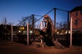 City attraction metal statue in old port of Klaipeda, Lithuania. Legend of black faceless ghost with lantern in hand