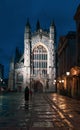 City of Bath, UK. 07-08-2021. Evening sightseeing of Bath Abbey next to restored Roman Baths.