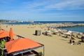 city beach with umbrellas and sun beds. Barcelona Royalty Free Stock Photo