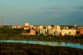 city behind the river, multi-storey buildings among trees, parks and squares, tilt-shift effect Royalty Free Stock Photo