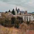 City of Bern seen from the Swiss parliament cliff with Bernisches Historisches Museum on sunset Royalty Free Stock Photo