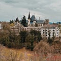 City of Bern seen from the Swiss parliament cliff with Bernisches Historisches Museum on sunset