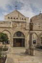 City of Bethlehem. The church Catherine next to the Basilica of the Nativity of Jesus Christ. Column with the figure of Saint